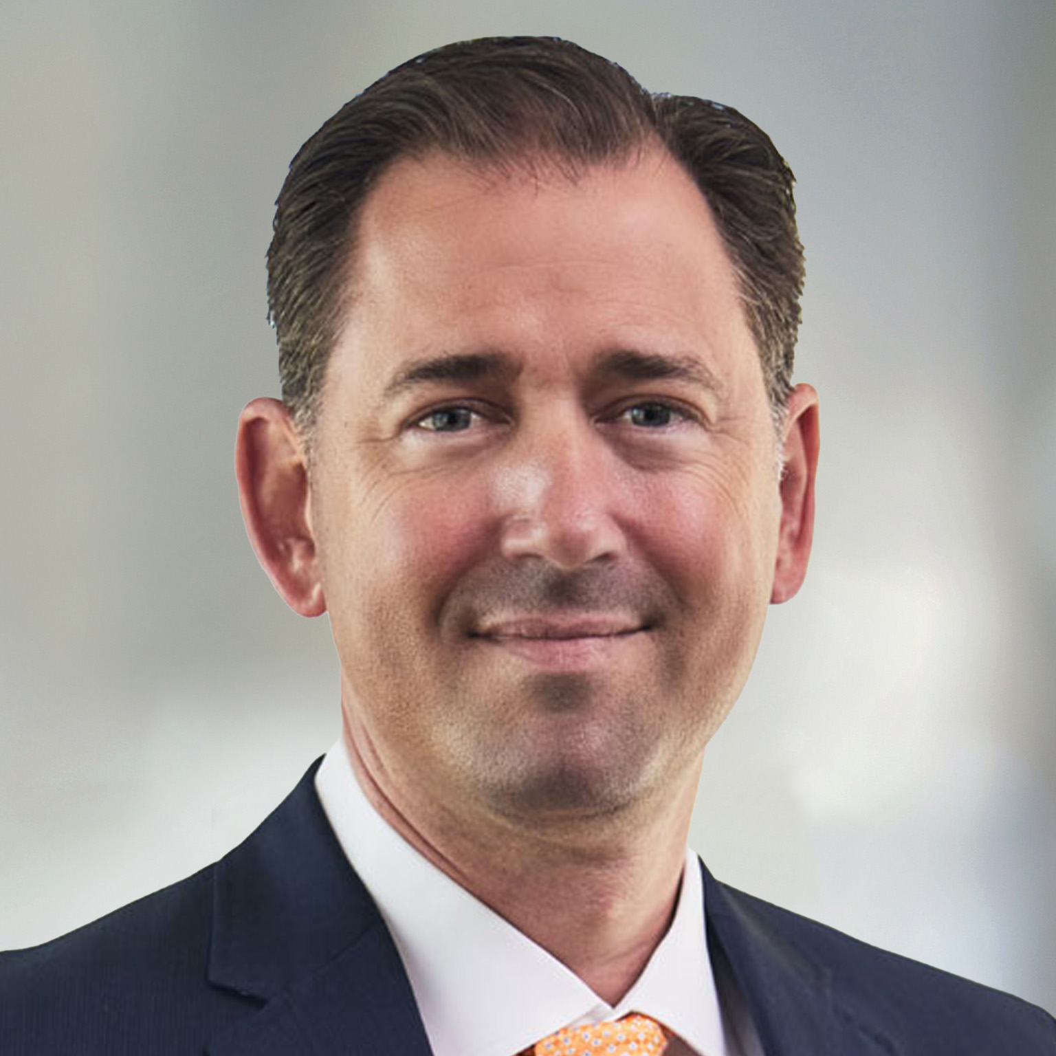 Brad Gries, LaSalle's Head of the Americas Co-Chief Investment Officer, Americas, smiling in a business suit.