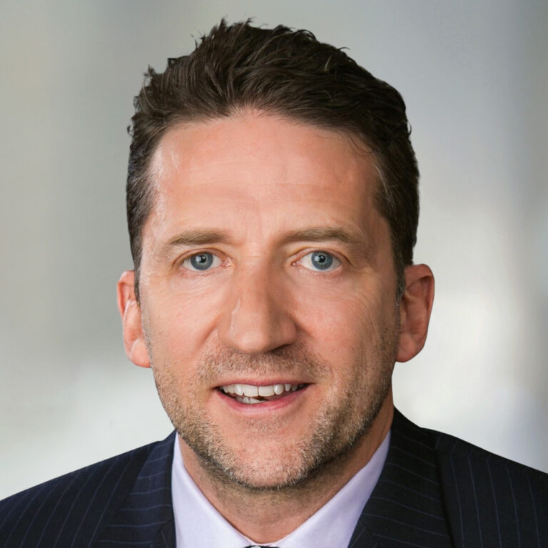 Craig Oram, LaSalle's Portfolio Manager and President, smiling in a business suit.