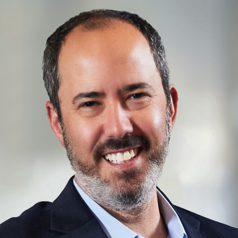 Rich Kleinman, LaSalle's Americas Head of Research and Strategy Co-Chief Investment Officer, smiling in a business suit.